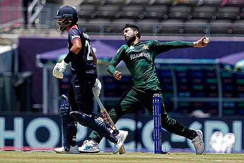 Pakistan's Mohammad Amir bowls against USA